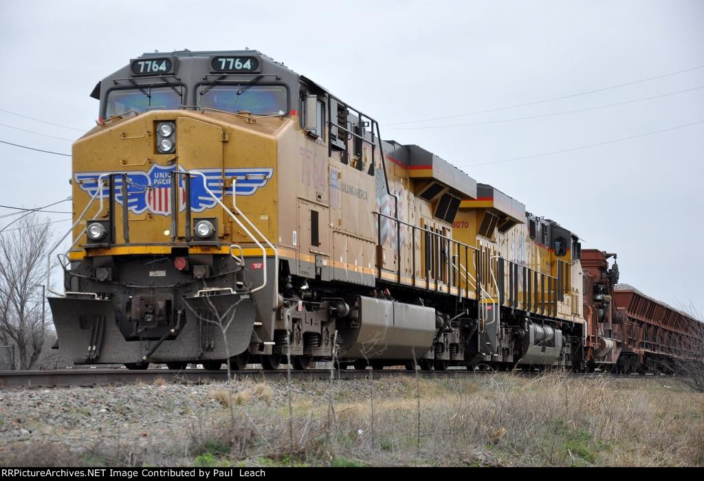 Tied down ballast train